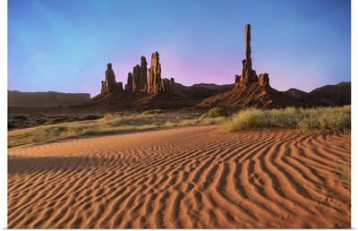 Sunrise at Totem Pole and Y'ei Bi Chei in Monument Valley, Arizona
