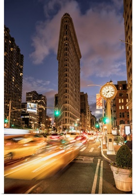 The Flatiron Building in New York City at sunset