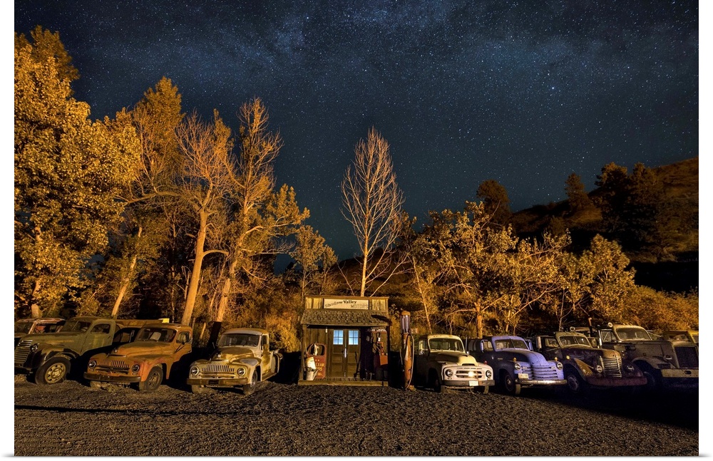 Vintage gas station and old cars after dark in the Palouse, Washington.