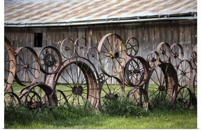Wagon wheels and barn in the Palouse region of Washington