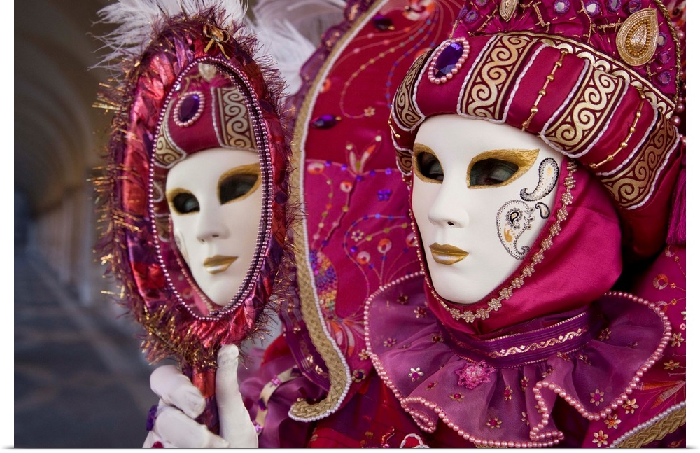 Woman in masquerade outfit at Carnival in Venice, Italy