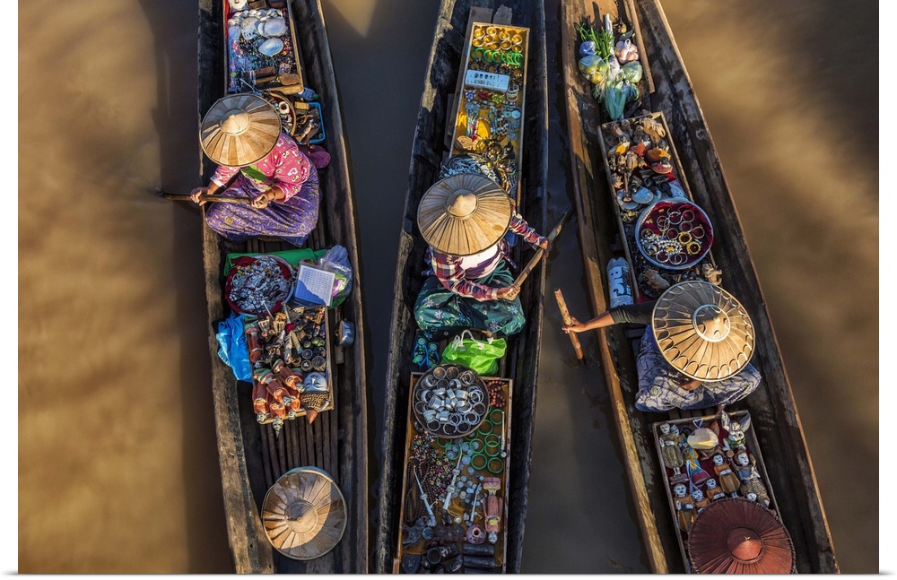 Women selling jewelry in longtail boats in Inle Lake, Burma