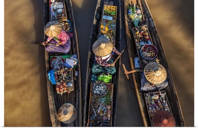 Women selling jewelry in longtail boats in Inle Lake, Burma