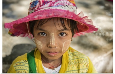 Young Burmese girl with Tanaka face paint