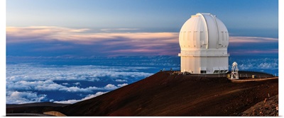 An Observatory Atop Hawaii's Mauna Kea At Sunset