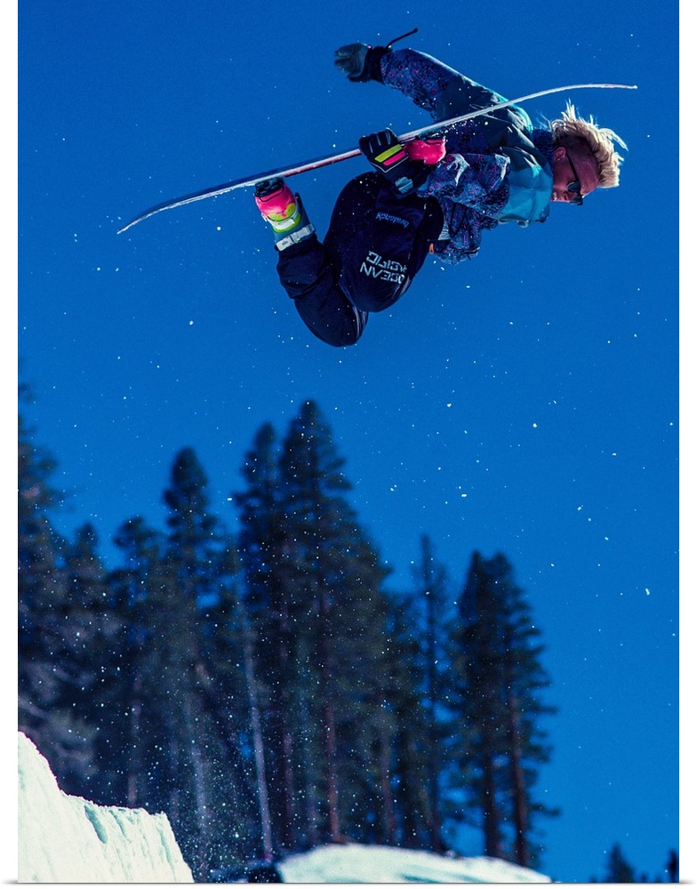 Damian Sanders grabs his snowboard in the air in June Mountain, June Lake, California.