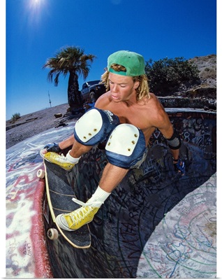 Jeff Ronnow skateboarding at the Nude Bowl in California, 1988