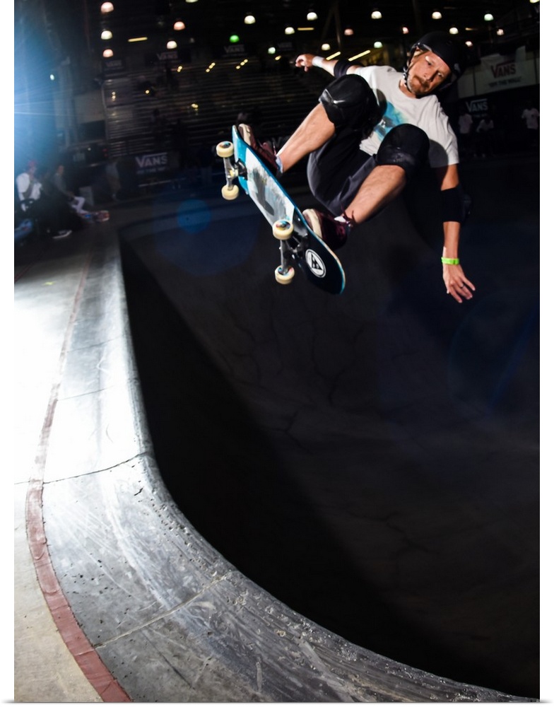 Chris Miller jumping on his skateboard at Vans Off The Wall Skatepark in Huntington Beach, California, 2016.