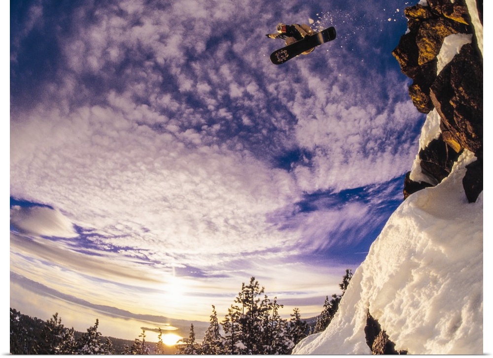 Morgan Stanford jumping on his snowboard at Lake Tahoe, California.