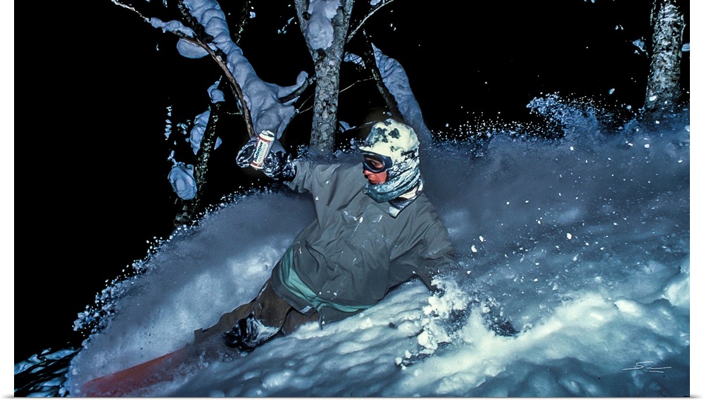 Vintage photo of Mike Ranquet as he rides some night powder while enjoying a beer in Niseko, Japan. Photo may have a film ...