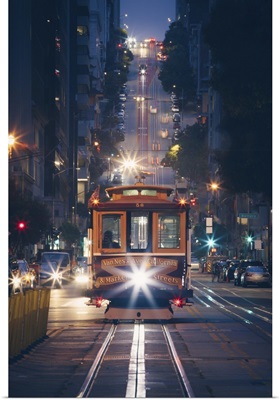 Cable Cars At Night With City Lights, San Francisco, California