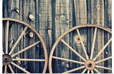 Close Up Of Two Wagon Wheels