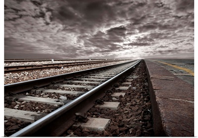 Empty Railroad Tracks With Stormclouds