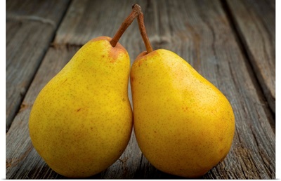 Fresh organic pears on old wood surface
