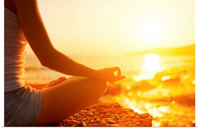 Hand Of  Woman Meditating In A Yoga Pose On Beach