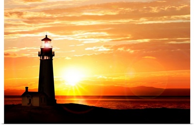 Lighthouse near ocean at sunset