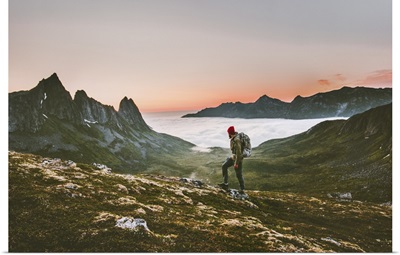 Man Backpacker Hiking In Mountains Alone In Norway Landscape