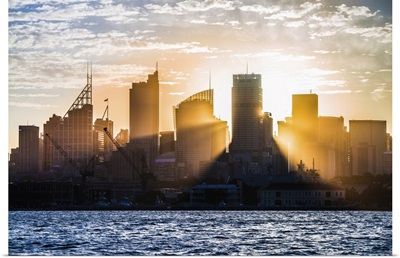 Sun Rays Shining Through The Skyline Of Sydney