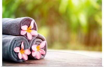 Tropical spa, beautiful fresh pink frangipani flower, outdoor setting spa