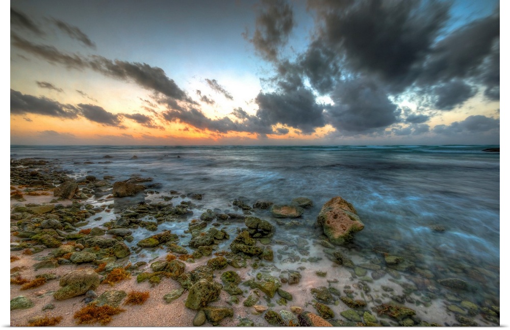 Sunrise in the Mayan Rivera beach front with a beautiful ocean view and sky.
