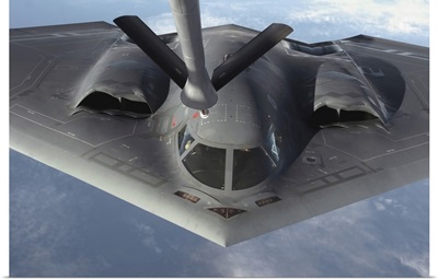 A B-2 Spirit Bomber Prepares To Refuel From A KC-135 Stratotanker