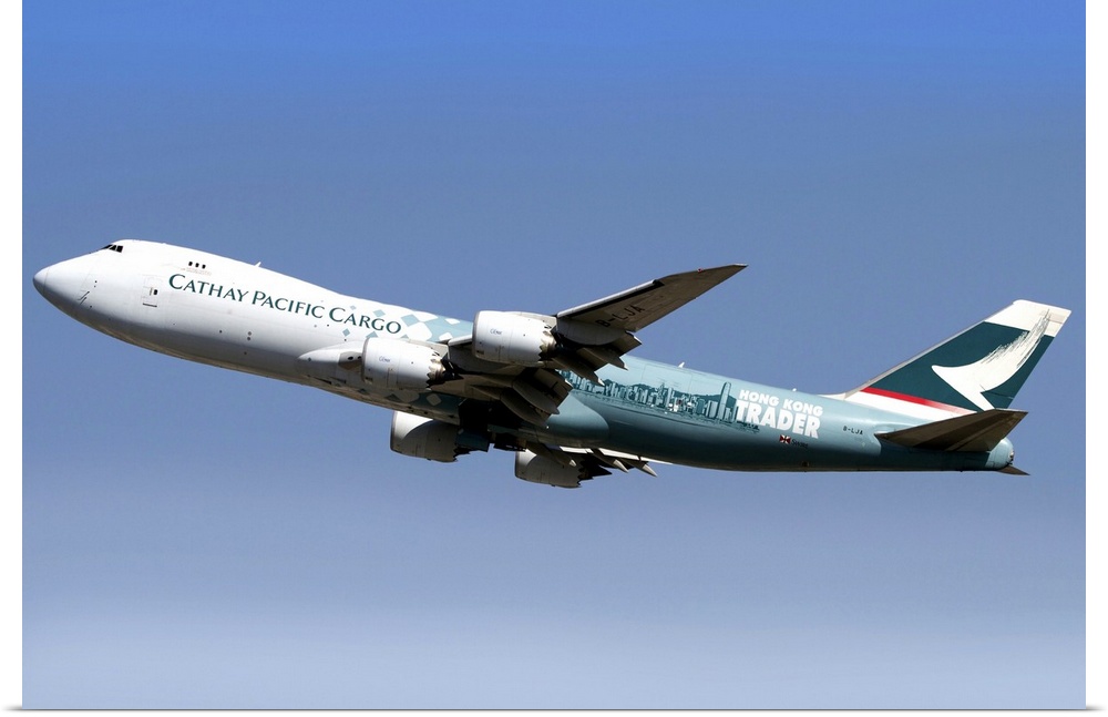 A Boeing 747-800 Cathay Pacific Cargo Hong Kong Trader in flight over Italy.