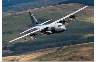 A C-130 Hercules of the Royal Air Force flying over North Wales