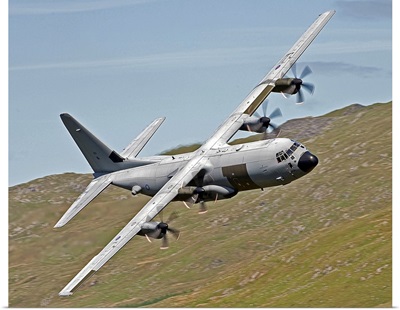 A C 130J Super Hercules low flying over North Wales on a training flight