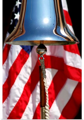 A ceremonial ships bell displayed during a dedication ceremony