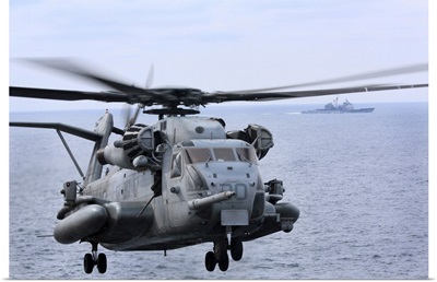 A CH-53E Super Stallion Conducts Flight Operations