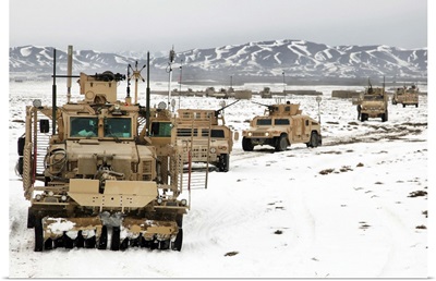 A convoy of vehicles during a route clearing procedure in Afghanistan