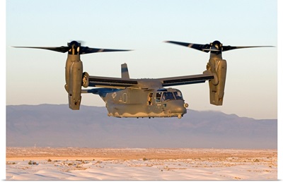 A CV-22 Osprey flies in helicopter mode