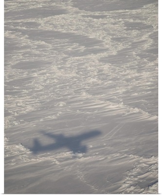 A DC-8 aircraft casts its shadow over the Bering Sea