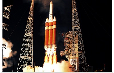 A Delta IV Heavy rocket lifts off