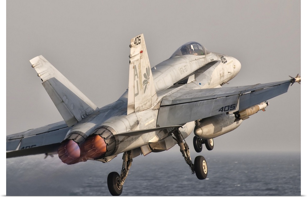 Persian Gulf, October 30, 2011 - A F/A-18C Hornet taking off from the flight deck of USS George H.W. Bush.
