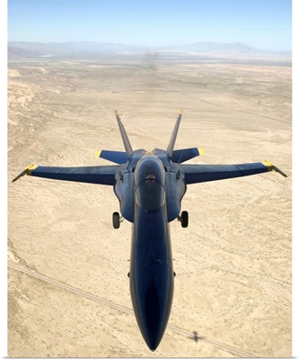 A F/A18A Hornet flys over the desert landscape of Imperial Valley