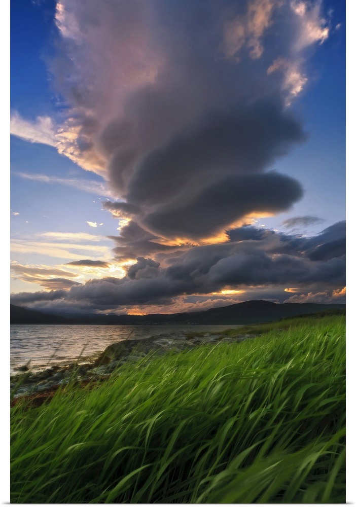 A giant stacked lenticular cloud over Tjeldsundet, Troms County, Norway.