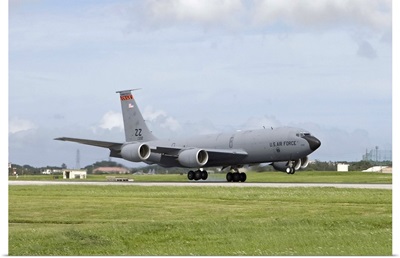 A KC-135 Stratotanker lands on the runway at Kadena Air Base, Japan