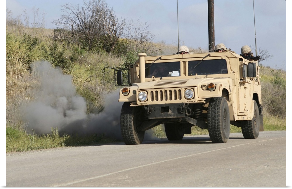 April 1, 2009 - A mock improvised explosive device explodes in the window of a humvee as part of convoy training at Camp P...