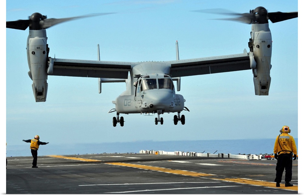 March 1, 2011 - A U.S. Marine Corps MV-22 Osprey aircraft prepares to land on the flight deck of amphibious assault ship U...