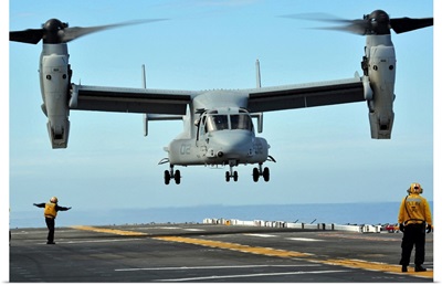 A MV-22 Osprey aircraft prepares to land on the flight deck