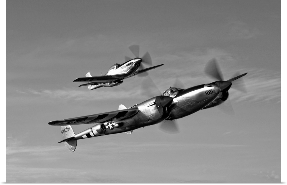 A P-38 Lightning and P-51D Mustang in flight over Chino, California.