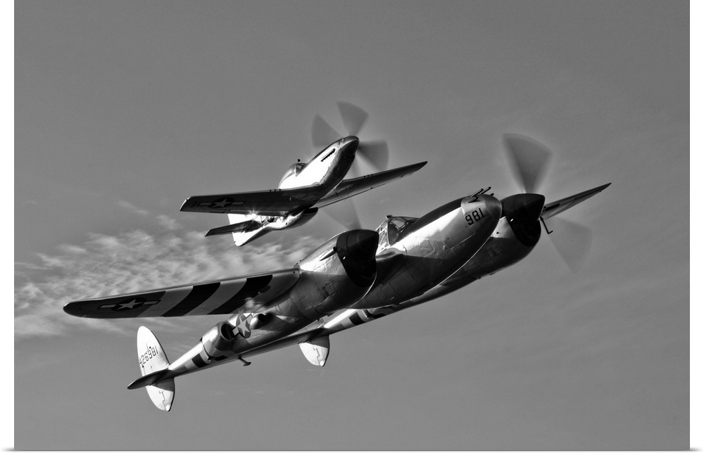 A P-38 Lightning and P-51D Mustang in flight over Chino, California.