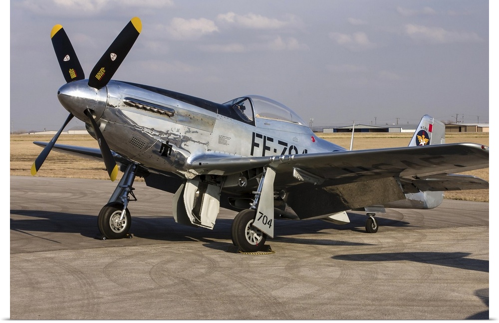 A P-51 Mustang parked on the ramp at Arlington, Texas.