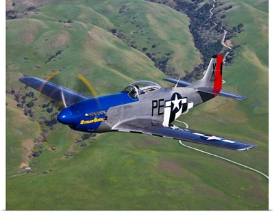 A P-51D Mustang in flight over Hollister, California