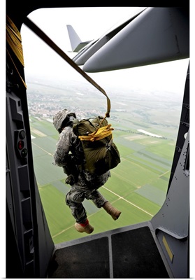 A Paratrooper Executes An Airborne Jump Out Of A C-17 Globemaster III