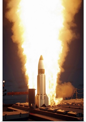 A Standard Missile Three is launched from the vertical launch system