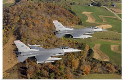 A two-ship formation of F-16 Fighting Falcons on a routine training mission