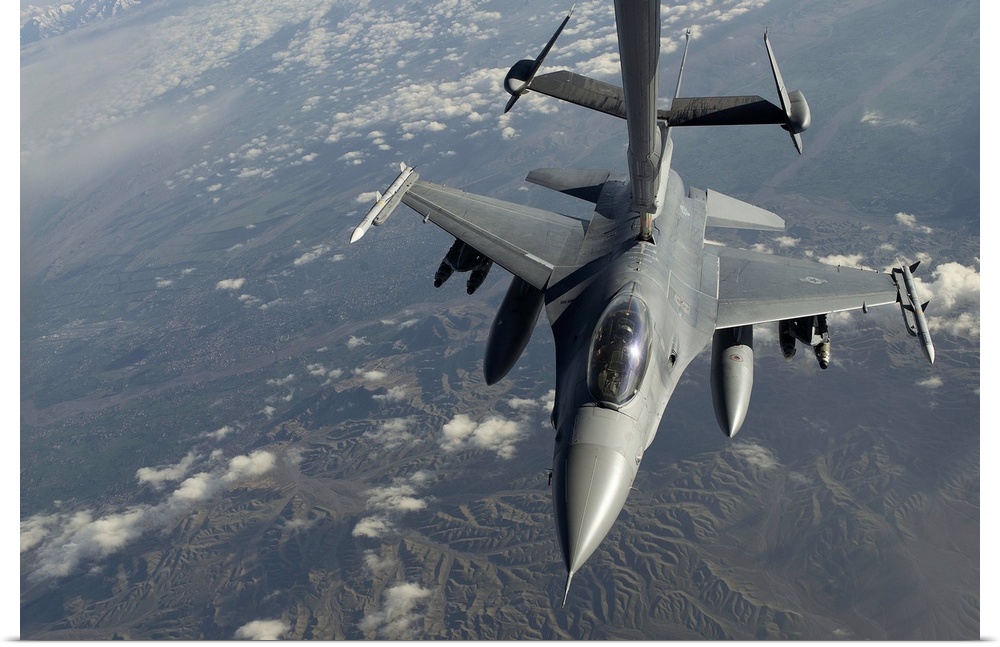 April 2, 2014 - A U.S. Air Force F-16C Fighting Falcon conducts aerial refueling with a KC-10 Extender advanced aerial tan...