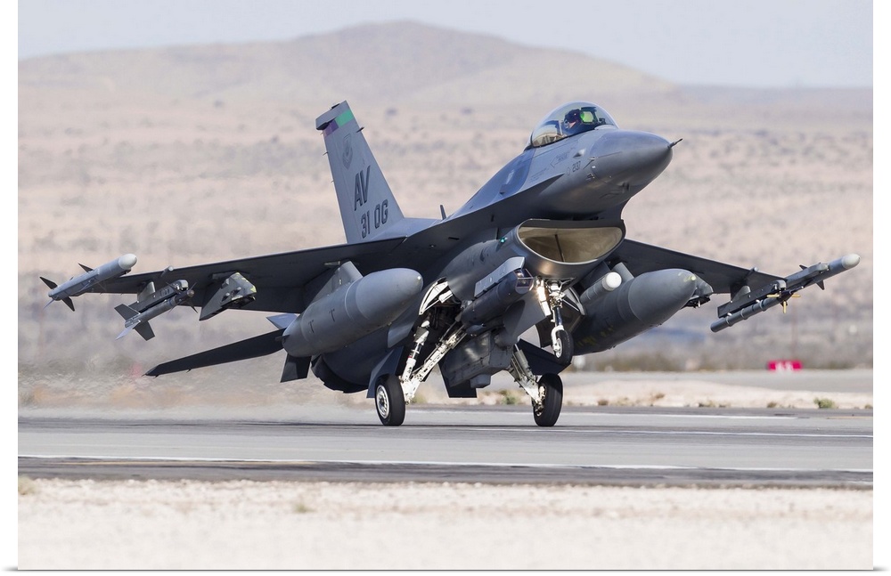 A U.S. Air Force F-16C Fighting Falcon landing at Nellis Air Force Base, Nevada.